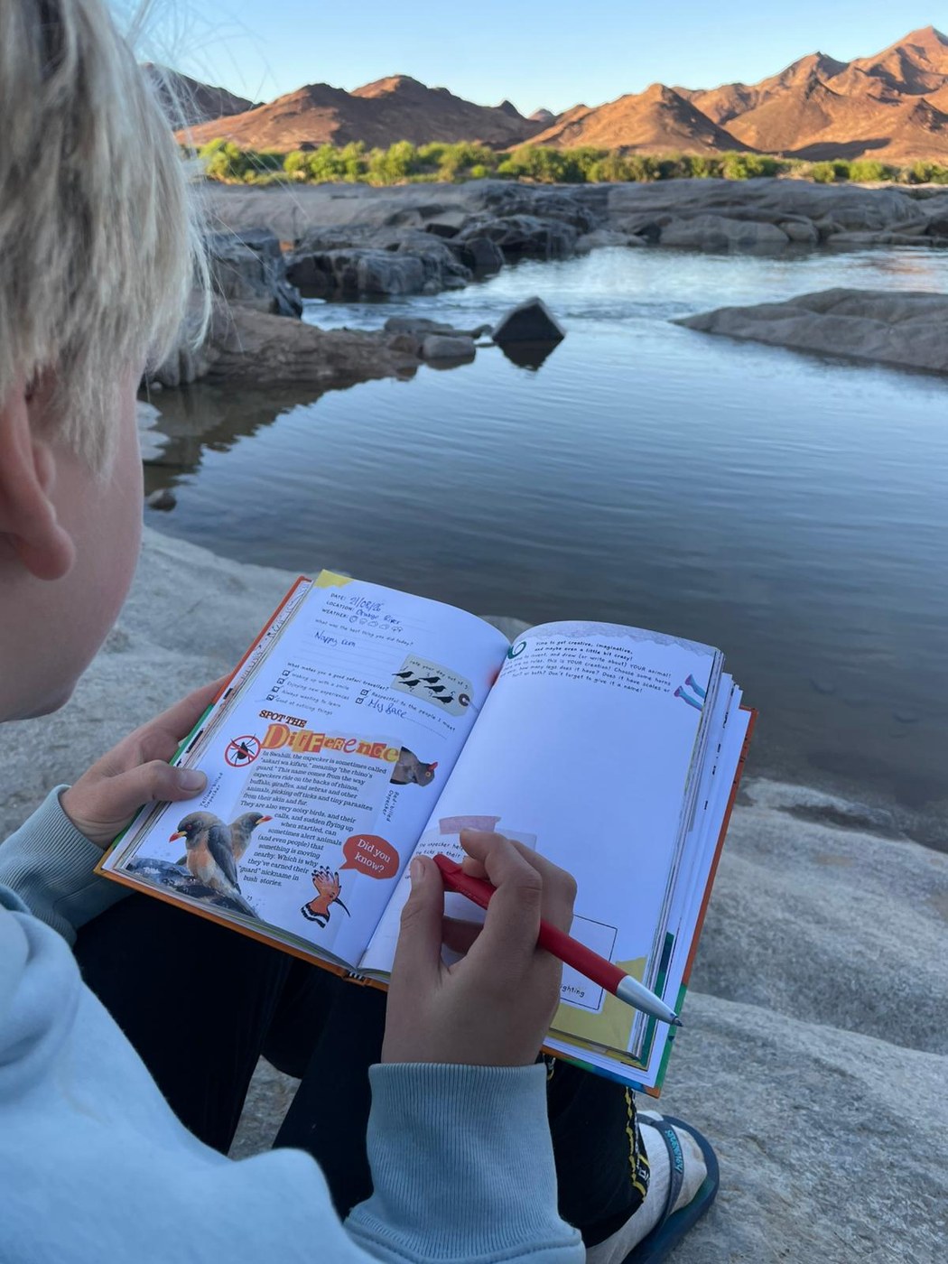A child with the African Safari Journal