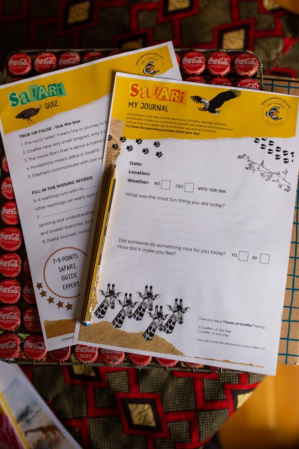 The free safari quiz and journal printables on a beaded African cloth
