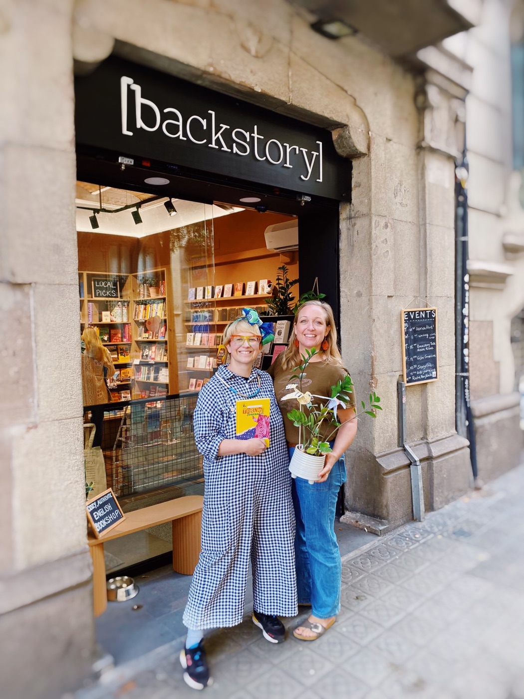 Misché and Kat outside Backstory Bookshop in Barcelona