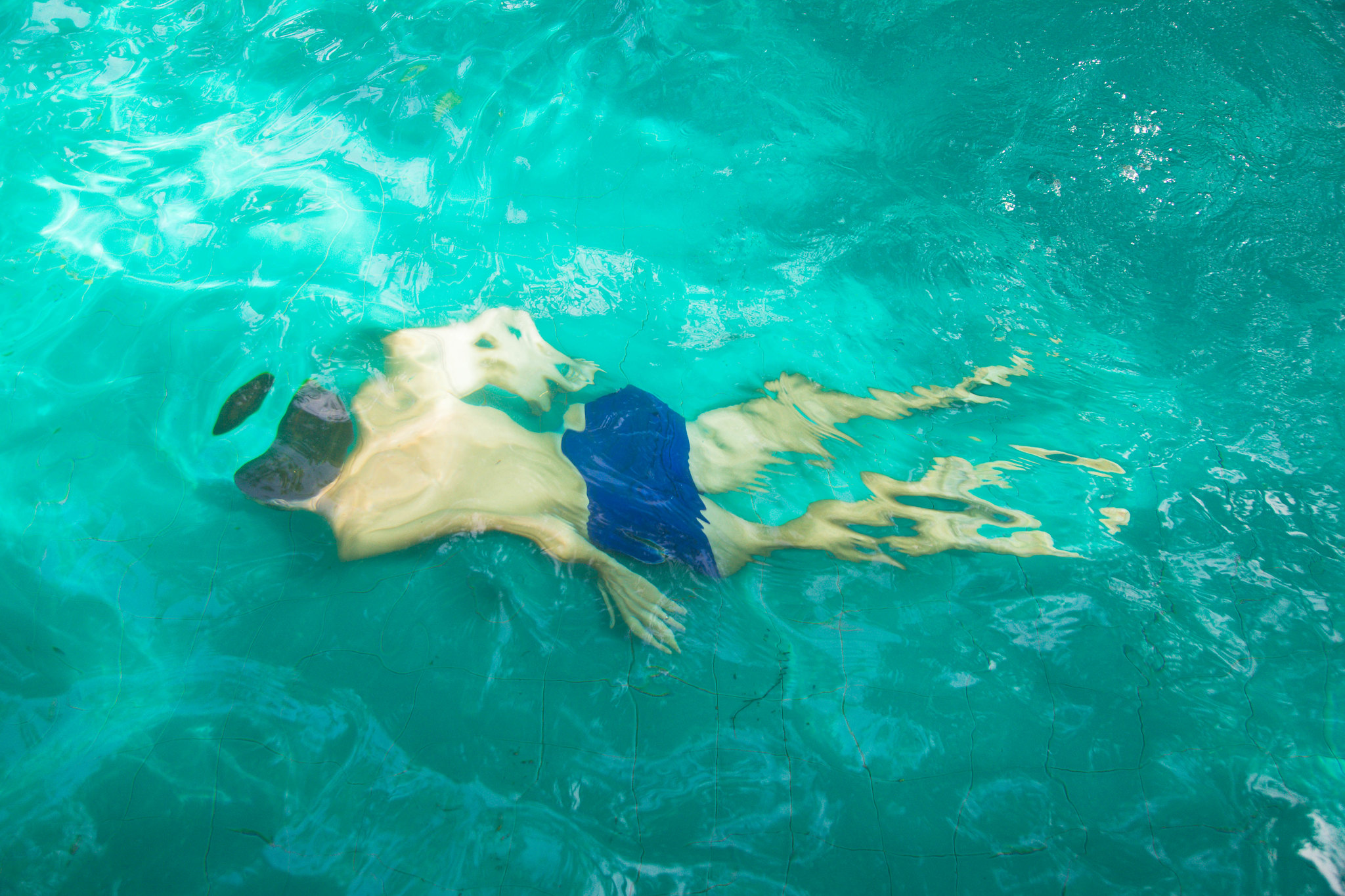 Children swimming safely at a South African beach