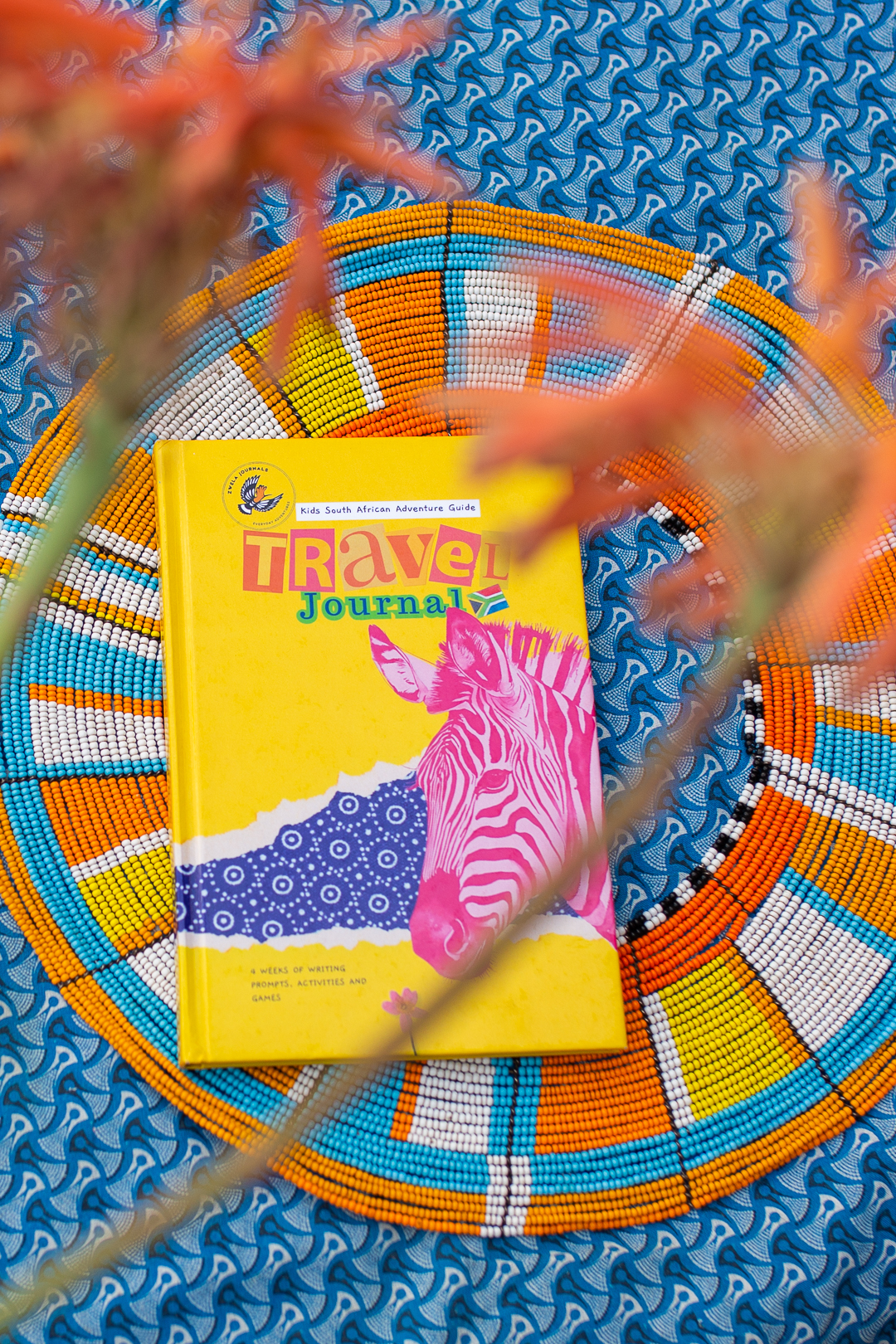 Zwela South African Travel Journal and pencils laid out ready for a safari